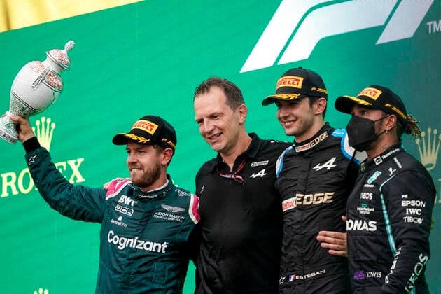 August 1, 2021, Mogyorod, Hungary: SEBASTIAN VETTEL of Germany and Aston Martin F1 Team, ESTEBAN OCON of France and Alpine F1 Team and LEWIS HAMILTON of Great Britain and Mercedes-AMG F1 Team are seen on the podium after the 2021 FIA Formula 1 Hungarian Grand Prix at the Hungaroring in Mogyorod near Budapest, Hungary. Mogyorod Hungary - ZUMAg147 20210801_zap_g147_077 Copyright: xJamesxGasperottix