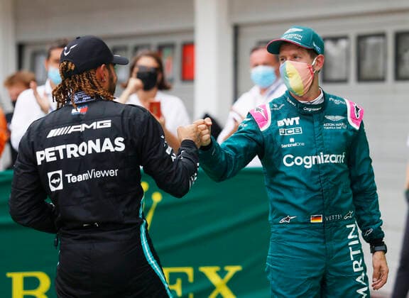 F1 Grand Prix of Hungary 44 Lewis Hamilton (GBR, Mercedes-AMG Petronas F1 Team), 5 Sebastian Vettel (GER, Aston Martin Cognizant F1 Team), F1 Grand Prix of Hungary at Hungaroring on August 1, 2021 in Budapest, Hungary. (Photo by Florion Goga REUTERS FIA Pool via HOCH ZWEI) Budapest Hungary Poolfoto HOCH ZWEI Pool REUTERS ,EDITORIAL USE ONLY