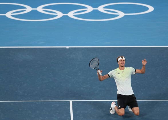 (210801) -- TOKYO, Aug. 1, 2021 -- Alexander Zverev of Germany celebrates after winning the tennis men s singles gold medal match against Karen Khachanov of ROC at the Tokyo 2020 Olympic Games, Olympische Spiele, Olympia, OS in Tokyo, Japan, Aug. 1, 2021. ) (TOKYO2020)JAPAN-TOKYO-OLY-TENNIS-MEN S SINGLES-GOLD DuxXiaoyi 