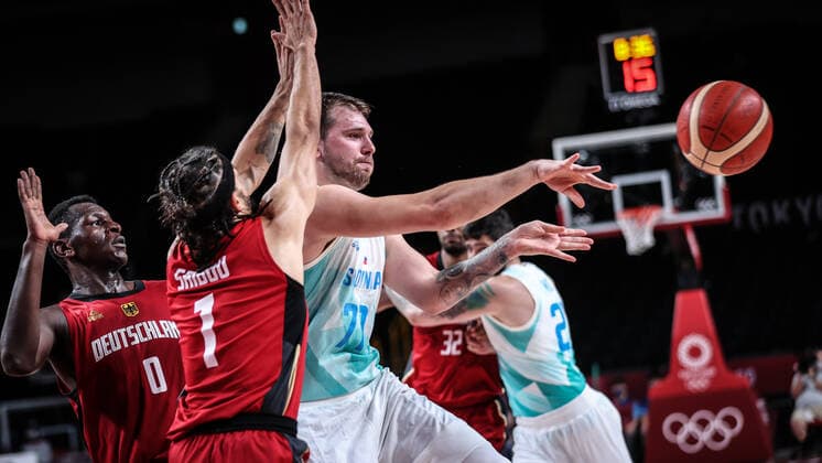 (210803) -- SAITAMA, Aug. 3, 2021 -- Luka Doncic (front, R) of Slovenia competes during the men s basketball quarterfinal match between Slovenia and Germany at Tokyo 2020 Olympic Games, Olympische Spiele, Olympia, OS in Saitama, Japan, Aug. 3, 2021. ) (TOKYO2020)JAPAN-SAITAMA-OLY-BASKETBALL-MEN S QUARTERFINAL-SLO VS GER PanxYulong 