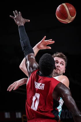 (210803) -- SAITAMA, Aug. 3, 2021 -- Luka Doncic (R) of Slovenia competes with Isaac Bonga of Germany during the men s basketball quarterfinal match between Slovenia and Germany at Tokyo 2020 Olympic Games, Olympische Spiele, Olympia, OS in Saitama, Japan, Aug. 3, 2021. ) (TOKYO2020)JAPAN-SAITAMA-OLY-BASKETBALL-MEN S QUARTERFINAL-SLO VS GER PanxYulong 