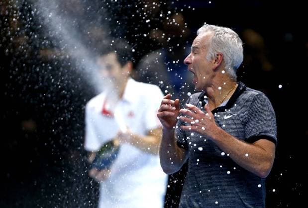 Mandatory Credit: Photo by Ella Ling Bpi Shutterstock (4244739ao) Tim Henman sprays champagne over John McEnroe at the exhibition at the ATP, Tennis Herren World Tour Finals, London, 2014 ATP Tennis World Tour 2014 ATP World Tour Finals Day Eight O2 Arena, Peninsula Square, London, United Kingdom - 16 Nov 2014 Editorial use only. No merchandising. ATP Tennis World Tour 2014 ATP World Tour Finals Day Eight O2 Arena, Peninsula Square, London, United Kingdom - 16 Nov 2014 Editorial use only. No merchandising.  Copyright: xEllaxLing Bpi Shutterstockx 4244739ao