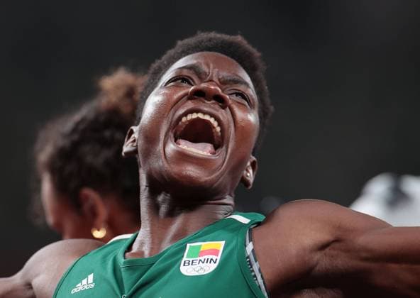 Tokio 2020 im Jahr 2021, Rückblick: Olympische Highlights (210804) -- TOKYO, Aug. 4, 2021 -- Odile Ahouanwanou of Benin reacts after the women s heptathlon 200m match at Tokyo 2020 Olympic Games, Olympische Spiele, Olympia, OS in Tokyo, Japan, Aug. 4, 2021. ) (TOKYO2020)XHTP-JAPAN-TOKYO-OLY-ATHLETICS-WOMEN S HEPTATHLON-200M LixGang 