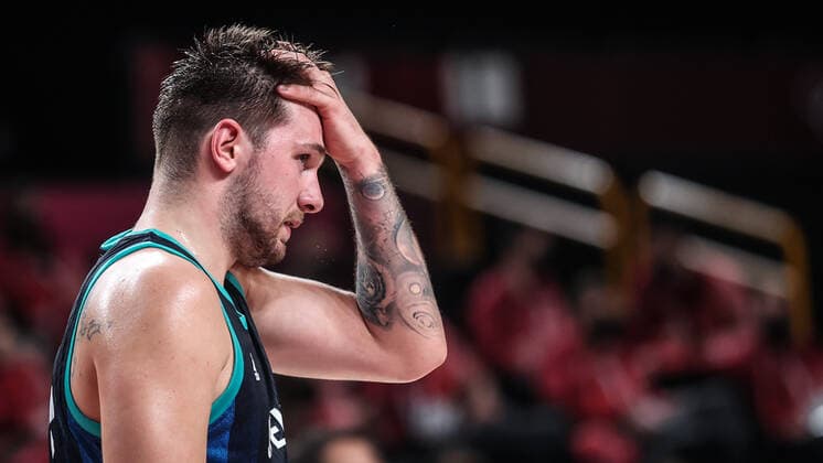(210805) -- SAITAMA, Aug. 5, 2021 -- Luka Doncic of Slovenia reacts during the men s basketball semifinal between France and Slovenia at Tokyo 2020 Olympic Games, Olympische Spiele, Olympia, OS in Saitama, Japan, Aug. 5, 2021. ) (TOKYO2020)JAPAN-SAITAMA-OLY-BASKETBALL-MEN S SEMIFINAL-FRA VS SLO PanxYulong 