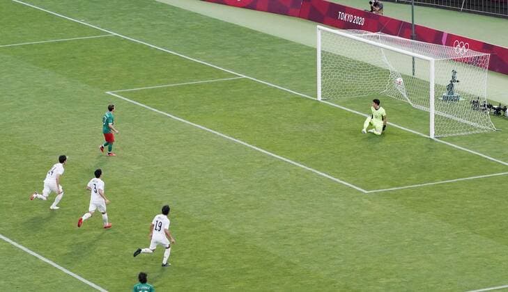 Tokyo Olympics: Football Mexico s Sebastian Cordova (top L) scores from the penalty spot during the first half of a Tokyo Olympic men s football bronze medal match against Japan on Aug. 6, 2021, at Saitama Stadium near Tokyo.  A14AA0000756854P