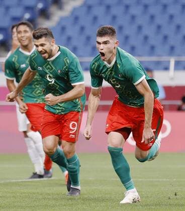 Tokyo Olympics: Football Johan Vasquez (R) reacts after scoring Mexico s second goal against Japan during the first half of a men s football bronze medal match at the Tokyo Olympics on Aug. 6, 2021, at Saitama Stadium near Tokyo.  A14AA0000756856P