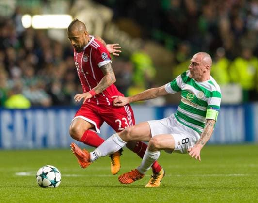Mandatory Credit: Photo by Stuart Wallace Shutterstock (9184676q) Arturo Vidal of Bayern Munich tackled by Scott Brown of Celtic Celtic v Bayern Munich, UEFA Champions League, Group B, Celtic Park, Glasgow, UK - 31 October 2017 Celtic v Bayern Munich, UEFA Champions League, Group B, Celtic Park, Glasgow, UK - 31 October 2017 Copyright: xStuartxWallace Shutterstockx 9184676q