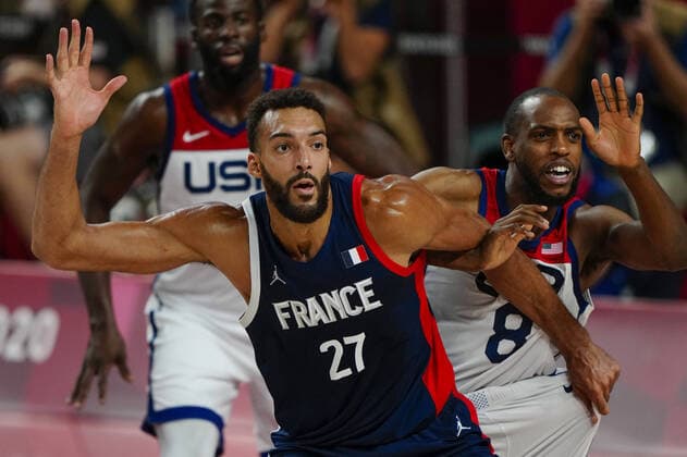 Mandatory Credit: Photo by Dave Shopland Shutterstock (12249257ay) Rudy Gobert of France (FRA) and Khris Middleton of the United States (USA) in action France v United States, Basketball, Men s final, Tokyo Olympic Games, Olympische Spiele, Olympia, OS 2020, Saitama Super Arena, Japan - 07 Aug 2021 France v United States, Basketball, Men s final, Tokyo Olympic Games 2020, Saitama Super Arena, Japan - 07 Aug 2021 Copyright: xDavexShopland Shutterstockx 12249257ay
