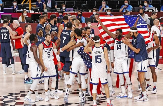 Tokyo Olympics: Basketball The U.S. men s basketball team celebrates after winning the Tokyo Olympic gold medal game against France on Aug. 7, 2021, at Saitama Super Arena near Tokyo.  A14AA0000756967P