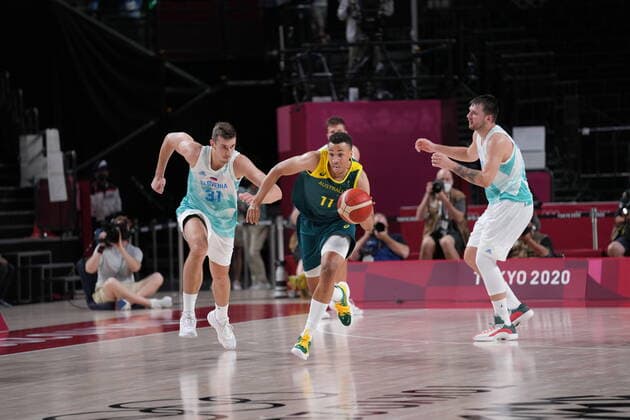 (210807) -- SAITAMA, Aug. 7, 2021 -- Dante Exum (C) of Australia competes during the men s basketball bronze medal match between Slovenia and Australia at the Tokyo 2020 Olympic Games, Olympische Spiele, Olympia, OS in Saitama, Japan, Aug. 7, 2021. ) (TOKYO2020)JAPAN-SAITAMA-OLY-BASKETBALL-MEN S BRONZE MEDAL MATCH MengxYongmin 