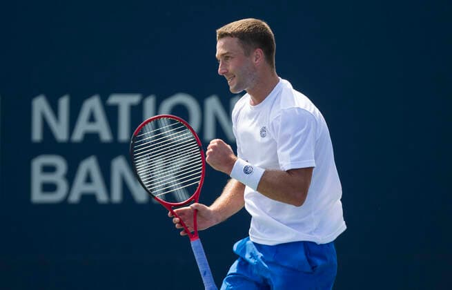 (210808) -- TORONTO, Aug. 8, 2021 -- Liam Broady of Britain celebrates scoring during the first round of men s qualifying singles match against Alexei Popyrin of Australia at the 2021 National Bank Open in Toronto, Canada, on Aug. 7, 2021. (Photo by Xinhua) (SP)CANADA-TORONTO-TENNIS-NATIONAL BANK OPEN-MEN S SINGLES-QUALIFYING ZouxZheng 