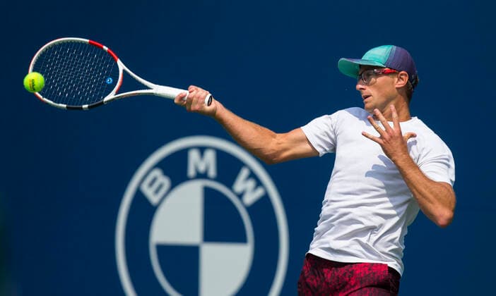 (210808) -- TORONTO, Aug. 8, 2021 -- Peter Polansky of Canada returns the ball against Dominik Koepfer of Germany during the first round of men s qualifying singles match at the 2021 National Bank Open in Toronto, Canada, on Aug. 7, 2021. (Photo by Xinhua) (SP)CANADA-TORONTO-TENNIS-NATIONAL BANK OPEN-MEN S SINGLES-QUALIFYING ZouxZheng 