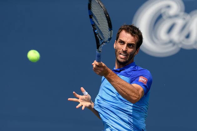 TORONTO, ON - AUGUST 09: Albert Ramos-Vinolas (ESP) returns the ball during his National Bank Open tennis tournament first round game on August 9, 2021, at Aviva Centre in Toronto, ON, Canada. (Photo by Julian Avram Icon Sportswire) TENNIS: AUG 09 National Bank Open Icon2108090008