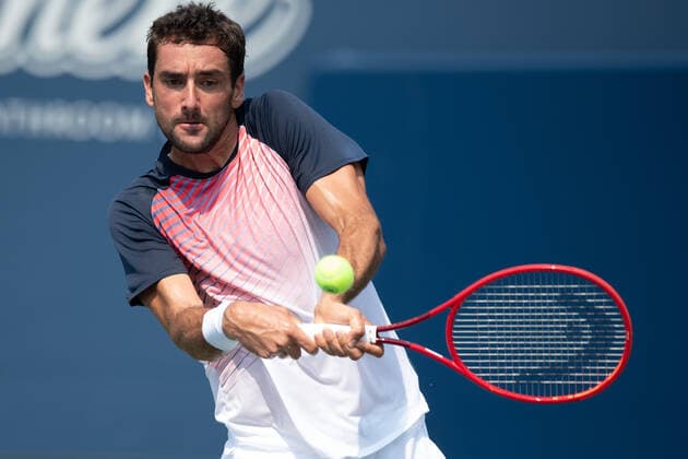 TORONTO, ON - AUGUST 09: Marin Cilic (CRO) returns the ball during his National Bank Open tennis tournament first round game on August 9, 2021, at Aviva Centre in Toronto, ON, Canada. (Photo by Julian Avram Icon Sportswire) TENNIS: AUG 09 National Bank Open Icon2108090010