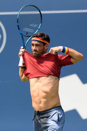 TORONTO, ON - AUGUST 09: Fabio Fognini (ITA) lifts his shirt in frustration during his National Bank Open tennis tournament first round game on August 9, 2021, at Aviva Centre in Toronto, ON, Canada. (Photo by Julian Avram Icon Sportswire) TENNIS: AUG 09 National Bank Open Icon2108090749
