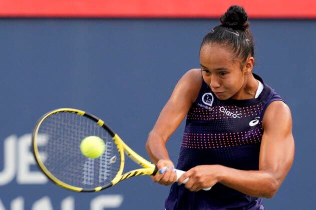 August 9, 2021, Montreal, PQ, Canada: Leylah Fernandez, of Canada, returns to Harriet Dart, of the United Kingdom, during National Bank Open tennis action in Montreal, Monday, Aug. 9, 2021. Canada News - August 9, 2021  - ZUMAc35_ 20210809_zaf_c35_139 Copyright: xPaulxChiassonx