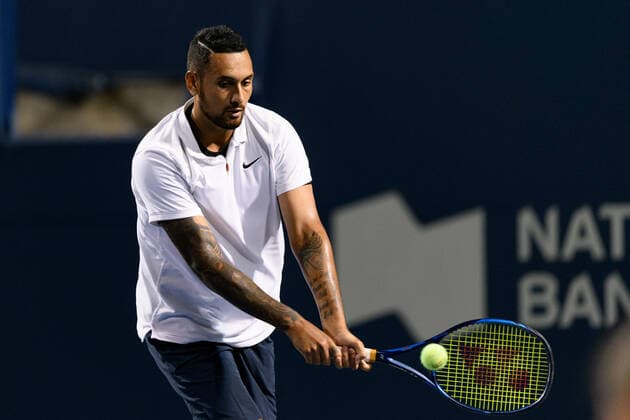 TORONTO, ON - AUGUST 09: Nick Kyrgios (AUS) returns the ball during his National Bank Open tennis tournament first round game on August 9, 2021, at Aviva Centre in Toronto, ON, Canada. (Photo by Julian Avram Icon Sportswire) TENNIS: AUG 09 National Bank Open Icon2108091931