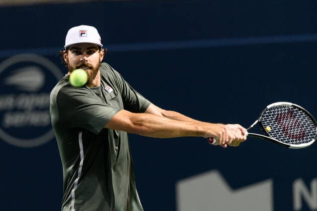 TORONTO, ON - AUGUST 09: Reilly Opelka (USA) returns the ball during his National Bank Open tennis tournament first round game on August 9, 2021, at Aviva Centre in Toronto, ON, Canada. (Photo by Julian Avram Icon Sportswire) TENNIS: AUG 09 National Bank Open Icon2108091933