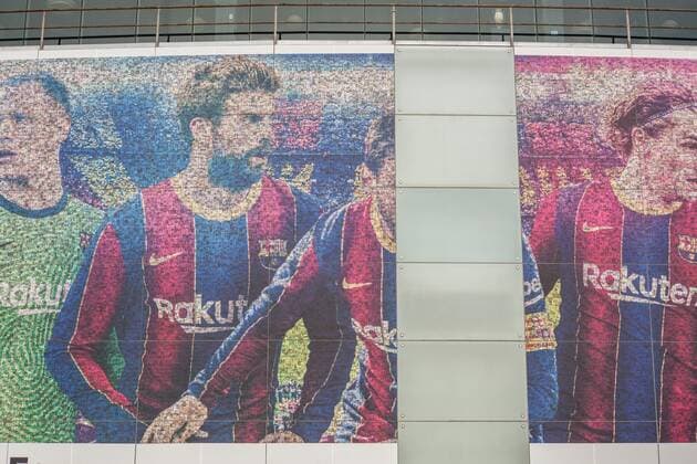 August 10, 2021, Barcelona, Spain: Lionel Messi s photo seen being removed from a poster at the Camp Nou stadium..The Football Club Barcelona has removed the image of Lionel Messi from the poster outside the Camp Nou stadium. Barcelona Spain - ZUMAs197 0129042549st Copyright: xThiagoxPrudenciox