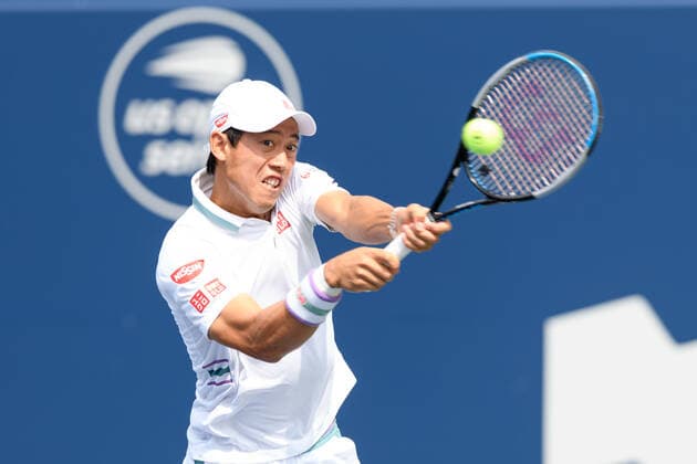 TORONTO, ON - AUGUST 10: Kei Nishikori (JPN) returns the ball during his National Bank Open tennis tournament first round game on August 10, 2021, at Aviva Centre in Toronto, ON, Canada. (Photo by Julian Avram Icon Sportswire) TENNIS: AUG 10 National Bank Open Icon2108100089