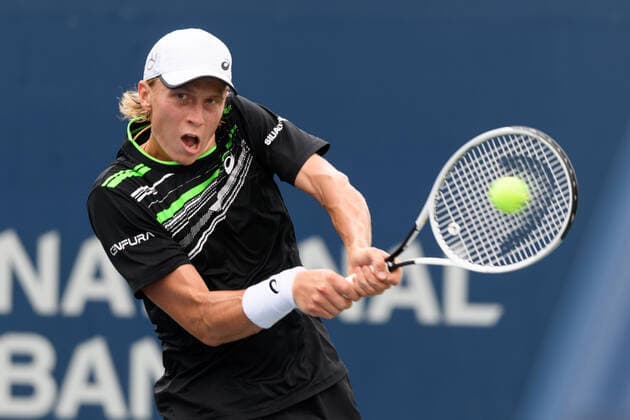 TORONTO, ON - AUGUST 10: Emil Ruusuvuori (FIN) returns the ball during his National Bank Open tennis tournament first round game on August 10, 2021, at Aviva Centre in Toronto, ON, Canada. (Photo by Julian Avram Icon Sportswire) TENNIS: AUG 10 National Bank Open Icon2108100216