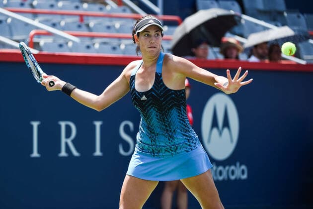 MONTREAL, QC - AUGUST 10: Grabine Muguruza (ESP) returns the ball during the second round WTA, Tennis Damen National Bank Open match on August 10, 2021 at IGA Stadium in Montreal, QC (Photo by David Kirouac Icon Sportswire) TENNIS: AUG 10 National Bank Open Icon210810045