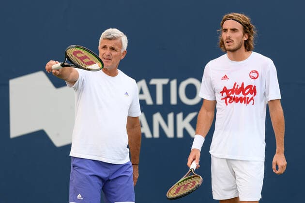 TORONTO, ON - AUGUST 10: Stefanos Tsitsipas (GRE) and his father coach Apostolos Tsitsipas warm up during the National Bank Open tennis tournament on August 10, 2021, at Aviva Centre in Toronto, ON, Canada. (Photo by Julian Avram Icon Sportswire) TENNIS: AUG 10 National Bank Open Icon2108102297