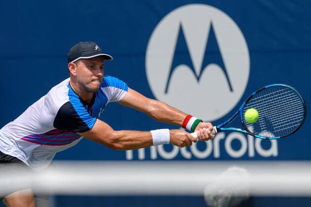 TORONTO, ON - AUGUST 11: James Duckworth (AUS) returns the ball during his National Bank Open tennis tournament second round game on August 11, 2021, at Aviva Centre in Toronto, ON, Canada. (Photo by Julian Avram Icon Sportswire) TENNIS: AUG 11 National Bank Open Icon2108110038