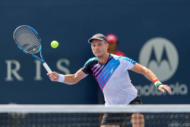 TORONTO, ON - AUGUST 11: James Duckworth (AUS) returns the ball during his National Bank Open tennis tournament second round game on August 11, 2021, at Aviva Centre in Toronto, ON, Canada. (Photo by Julian Avram Icon Sportswire) TENNIS: AUG 11 National Bank Open Icon2108110042