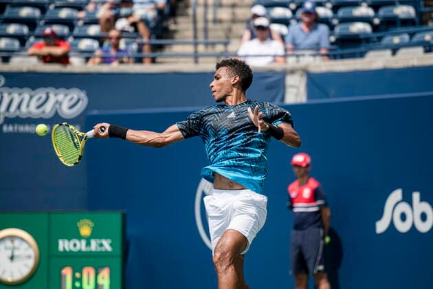 August 11, 2021, Toronto, on, Canada: Canada s Felix Auger-Aliassime returns the ball to Serbia s Dusan Lajovic during Men s National Bank Open tennis action, in Toronto on Wednesday, Aug., 11, 2021. Canada News - August 11, 2021  - ZUMAc35_ 20210811_zaf_c35_055 Copyright: xChristopherxKatsarovx