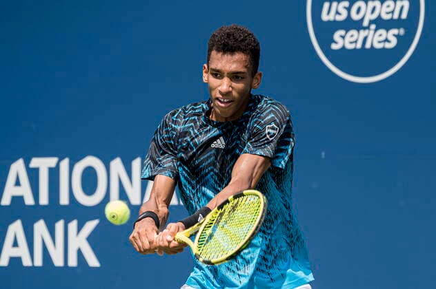 August 11, 2021, Toronto, on, Canada: Canada s Felix Auger-Aliassime returns the ball to Serbia s Dusan Lajovic during Men s National Bank Open tennis action, in Toronto on Wednesday, Aug., 11, 2021. Canada News - August 11, 2021  - ZUMAc35_ 20210811_zaf_c35_058 Copyright: xChristopherxKatsarovx