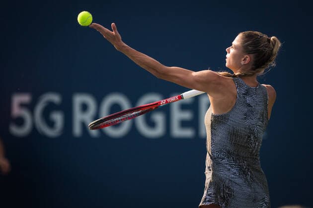 MONTREAL, QC - AUGUST 11:Camila Giorgi from Italia serves the ball during the second round WTA, Tennis Damen National Bank Open match on August 11, 2021 at IGA Stadium in Montreal, QC (Photo by Vincent Ethier Icon Sportswire) TENNIS: AUG 11 National Bank Open Icon2108112269