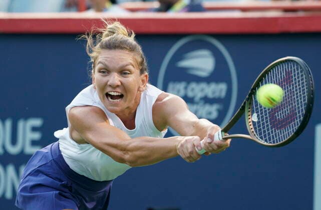 August 11, 2021, Montreal, PQ, Canada: Simona Halep, of Roumania, returns to Danielle Collins, of the United States, during second round of play at the National Bank Open tennis tournament Wednesday August 11, 2021 in Montreal. Simona Halep  - ZUMAc35_ 20210811_zaf_c35_141 Copyright: xPaulxChiassonx