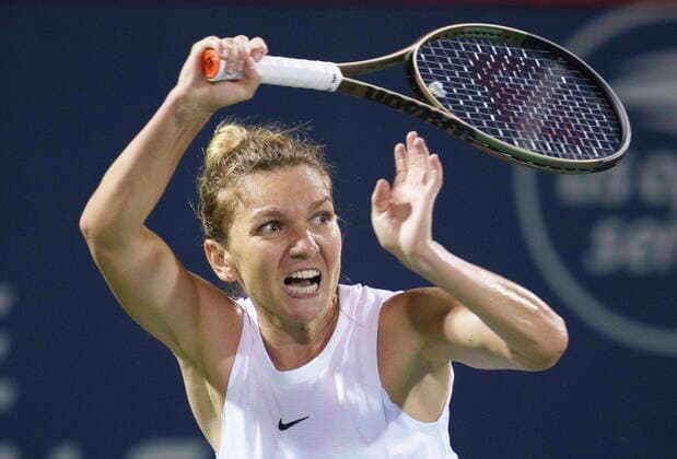 August 11, 2021, Montreal, PQ, Canada: Simona Halep of Roumania returns to Danielle Collins of the United States during second round of play at the National Bank Open tennis tournament Wednesday August 11, 2021 in Montreal. Simona Halep  - ZUMAc35_ 20210811_zaf_c35_267 Copyright: xPaulxChiassonx
