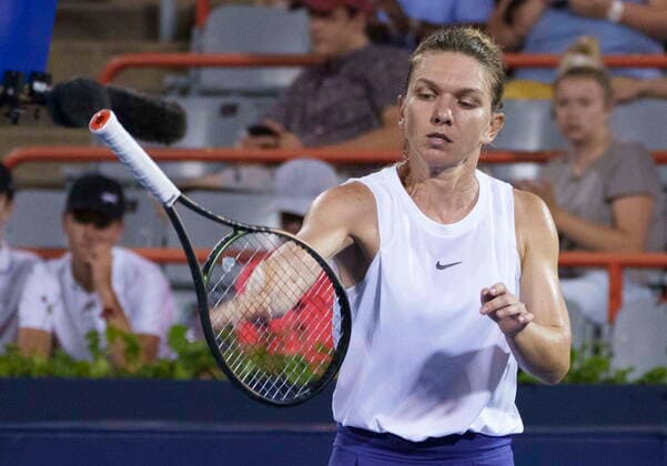 August 11, 2021, Montreal, PQ, Canada: Simona Halep of Roumania tosses her racket during her match against Danielle Collins of the United States during second round of play at the National Bank Open tennis tournament Wednesday August 11, 2021 in Montreal. Simona Halep  - ZUMAc35_ 20210811_zaf_c35_295 Copyright: xPaulxChiassonx