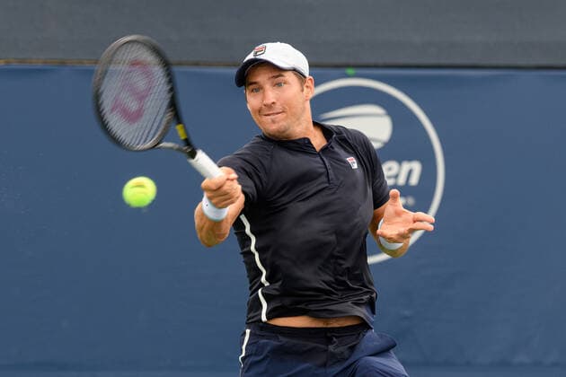 TORONTO, ON - AUGUST 12: Dusan Lajovic (SRB) returns the ball during his National Bank Open tennis tournament third round game on August 12, 2021, at Aviva Centre in Toronto, ON, Canada. (Photo by Julian Avram Icon Sportswire) TENNIS: AUG 12 National Bank Open Icon2108120031