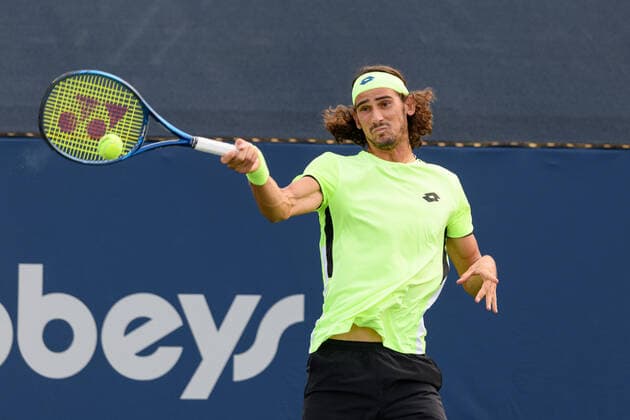 TORONTO, ON - AUGUST 12: Lloyd Harris (RSA) returns the ball during his National Bank Open tennis tournament third round game on August 12, 2021, at Aviva Centre in Toronto, ON, Canada. (Photo by Julian Avram Icon Sportswire) TENNIS: AUG 12 National Bank Open Icon2108120742