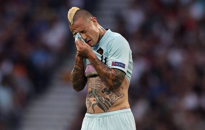 Mandatory Credit: Photo by Kieran Mcmanus BPI Shutterstock (5737077z) Radja Nainggolan of Belgium wipes his face revealing his tattooed chest during the UEFA EURO, EM, Europameisterschaft,Fussball 2016 Round of 16 match between Hungary and Belgium played at Stadium de Toulouse, Toulouse, France on June 26th 2016 Football - UEFA European Championships 2016 Round of 16 Hungary v Belgium Stade de Toulouse, Toulouse, France - 26 Jun 2016 EDITORIAL USE ONLY No use with unauthorised audio, video, data, fixture lists, club league logos or live services. Online in-match use limited to 75 images, no video emulation. No use in betting, games or single club league player publications. Football - UEFA European Championships 2016 Round of 16 Hungary v Belgium Stade de Toulouse, Toulouse, France - 26 Jun 2016 EDITORIAL USE ONLY No use with unauthorised audio, video, data, fixture lists, club league logos or live services. Online in-match use limited to 75 images, no video emulation. No use in betting, games or single club league player publications.  Copyright: xKieranxMcmanus BPI Shutterstockx 5737077z
