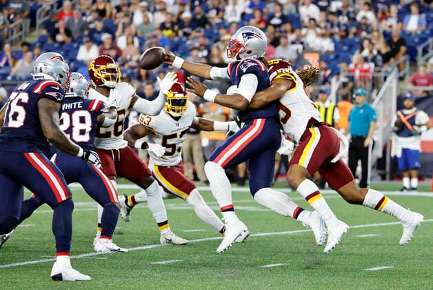 FOXBOROUGH, MA - AUGUST 12: Washington Football Team defensive end Chase Young (99) forces the fumble from New England Patriots quarterback Cam Newton (1) during a preseason game between the New England Patriots and the Washington Football Team on August 12, 2021, at Gillette Stadium in Foxborough, Massachusetts. (Photo by Fred Kfoury III Icon Sportswire) NFL, American Football Herren, USA AUG 12 Preseason - Washington Football Team at Patriots Icon482210812002