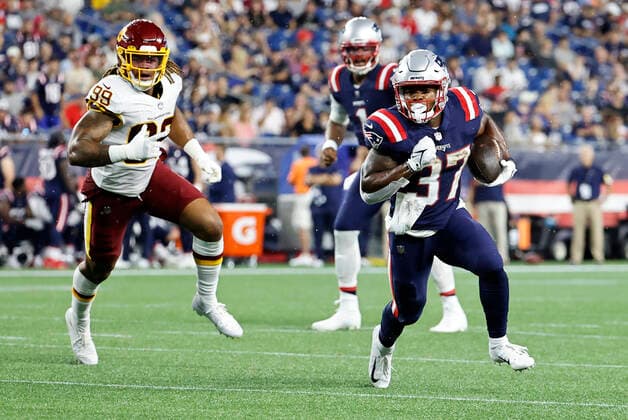 FOXBOROUGH, MA - AUGUST 12: New England Patriots running back Damien Harris (37) chased by Washington Football Team defensive end Chase Young (99) during a preseason game between the New England Patriots and the Washington Football Team on August 12, 2021, at Gillette Stadium in Foxborough, Massachusetts. (Photo by Fred Kfoury III Icon Sportswire) NFL, American Football Herren, USA AUG 12 Preseason - Washington Football Team at Patriots Icon482210812011