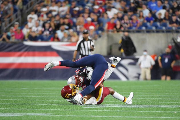 Thursday, August 12, 2021: New England Patriots wide receiver Jakobi Meyers (16) is tackled by New England Patriots defensive back Kyle Dugger (23) during the NFL, American Football Herren, USA preseason game between the Washington Football Team and the New England Patriots held at Gillette Stadium, in Foxborough, Massachusetts. CSM Foxborough USA - ZUMAc04_ 20210812_zaf_c04_063 Copyright: xEricxCanhax