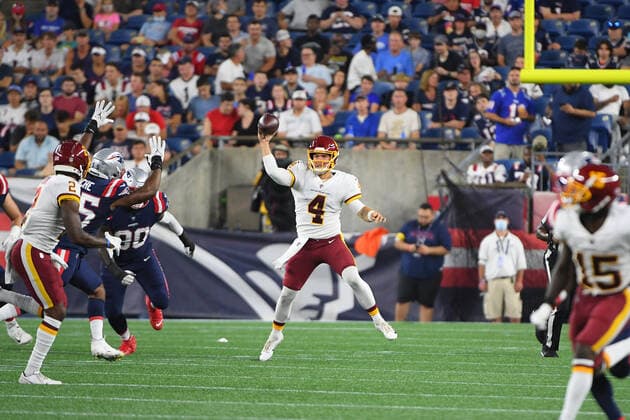 Thursday, August 12, 2021: Washington Football Team quarterback Taylor Heinicke (4) fires on the run during the NFL, American Football Herren, USA preseason game between the Washington Football Team and the New England Patriots held at Gillette Stadium, in Foxborough, Massachusetts. CSM Foxborough USA - ZUMAc04_ 20210812_zaf_c04_065 Copyright: xEricxCanhax