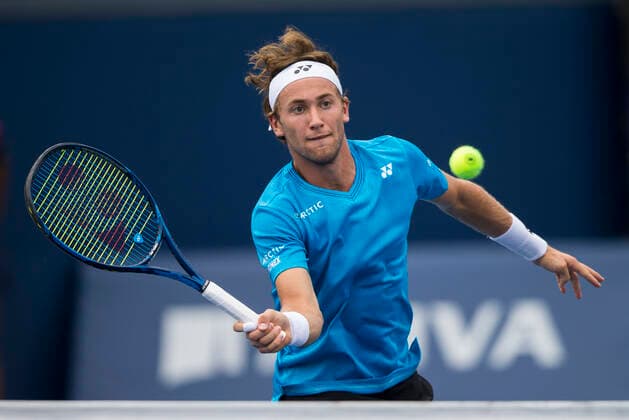 (210813) -- TORONTO, Aug. 13, 2021 -- Casper Ruud of Norway returns the ball against Dusan Lajovic of Serbia during the third round of men s singles match at the 2021 National Bank Open in Toronto, Canada, on Aug. 12, 2021. (Photo by Xinhua) (SP)CANADA-TORONTO-TENNIS-NATIONAL BANK OPEN-MEN S SINGLE ZouxZheng 