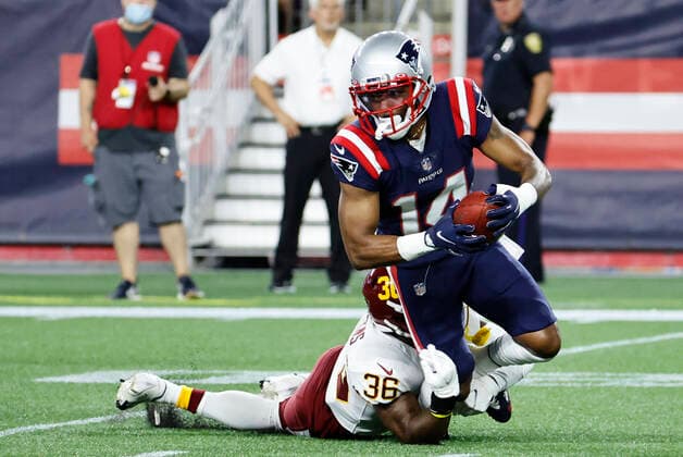 FOXBOROUGH, MA - AUGUST 12: Washington Football Team cornerback Linden Stephens (36) tackles New England Patriots wide receiver Marvin Hall (14) during a preseason game between the New England Patriots and the Washington Football Team on August 12, 2021, at Gillette Stadium in Foxborough, Massachusetts. (Photo by Fred Kfoury III Icon Sportswire) NFL, American Football Herren, USA AUG 12 Preseason - Washington Football Team at Patriots Icon482210812026