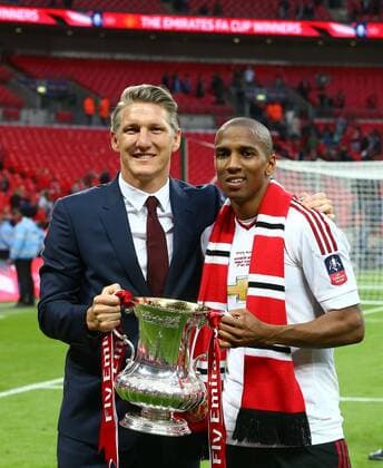 Mandatory Credit: Photo by Michael Zemanek BPI Shutterstock (5691437ci) Bastian Schweinsteiger and Ashley Young of Manchester United, ManU poses with the FA Cup trophy during the Emirates FA Cup Final match between Manchester United and Crystal Palace played at Wembley Stadium, London on 21st May 2016 The Emirates FA Cup 2015 16 Final Crystal Palace v Manchester United Wembley Stadium, Wembley, London, United Kingdom - 21 May 2016 EDITORIAL USE ONLY No use with unauthorised audio, video, data, fixture lists, club league logos or live services. Online in-match use limited to 75 images, no video emulation. No use in betting, games or single club league player publications. The Emirates FA Cup 2015 16 Final Crystal Palace v Manchester United Wembley Stadium, Wembley, London, United Kingdom - 21 May 2016 EDITORIAL USE ONLY No use with unauthorised audio, video, data, fixture lists, club league logos or live services. Online in-match use limited to 75 images, no video emulation. No use in betting, games or single club league player publications.  Copyright: xMichaelxZemanek BPI Shutterstockx 5691437ci