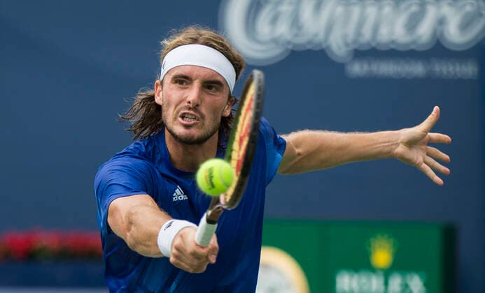 Sport Bilder des Tages (210814) -- TORONTO, Aug. 14, 2021 -- Stefanos Tsitsipas of Greece returns the ball against Casper Ruud of Norway during the quarterfinals of men s singles match at the 2021 National Bank Open in Toronto, Canada, on Aug. 13, 2021. (Photo by Xinhua) (SP)CANADA-TORONTO-TENNIS-NATIONAL BANK OPEN-MEN S SINGLES-QUARTERFINALS ZouxZheng 