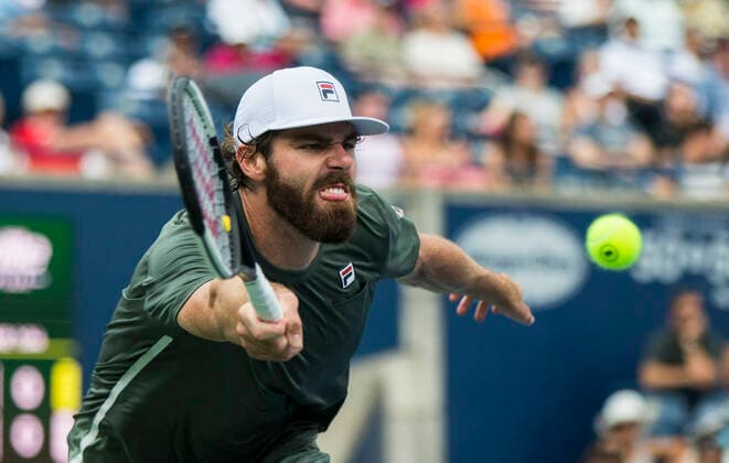 (210814) -- TORONTO, Aug. 14, 2021 -- Reilly Opelka of the United States returns the ball against Roberto Bautista Agut of Spain during the quarterfinals of men s singles match at the 2021 National Bank Open in Toronto, Canada, on Aug. 13, 2021. (Photo by Xinhua) (SP)CANADA-TORONTO-TENNIS-NATIONAL BANK OPEN-MEN S SINGLES-QUARTERFINALS ZouxZheng 