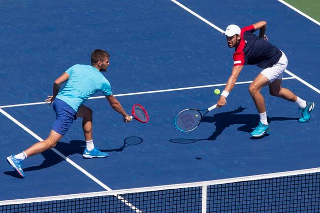 August 14, 2021, Toronto, on, Canada: Croatia s Nikola Mektic, left, and Mate Pavic return during their 7-6 7-6 win against Kevin Krawietz, of Germany, and Horia Tecau, of Romania, in National Bank Open men s tennis action in Toronto, Saturday, Aug. 14, 2021 Niikola Mektic; Mate Pavic.. - ZUMAc35_ 20210814_zaf_c35_016 Copyright: xChrisxYoungx