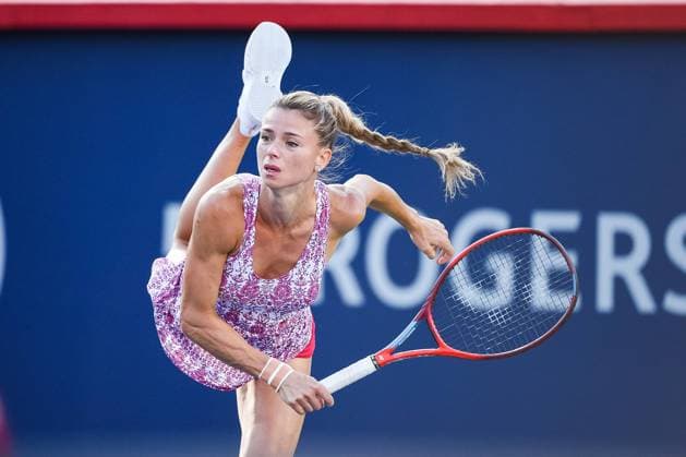 Sport Bilder des Tages August 14, 2021: Camila Giorgi (ITA) serves the ball during the WTA, Tennis Damen National Bank Open semifinal match at IGA Stadium in Montreal, Quebec. CSM Montreal Canada - ZUMAc04_ 20210814_zaf_c04_045 Copyright: xDavidxKirouacx