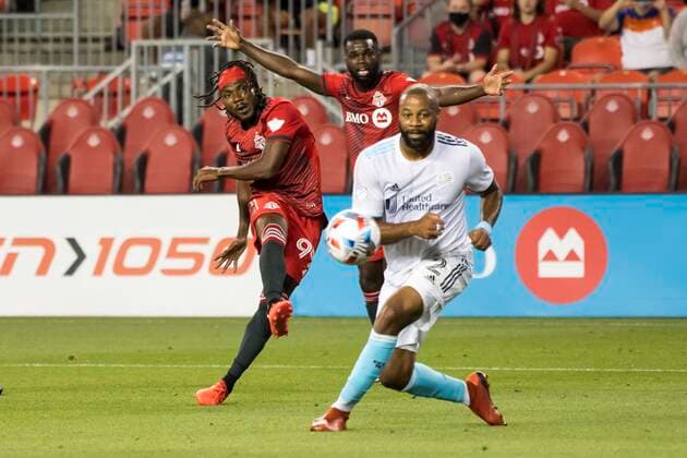 August 14, 2021, Toronto, Ontario, Canada: Ifunanyachi Achara (99) and Andrew Farrell (2) in action during the MLS, Fussball Herren, USA game between between Toronto FC and New England Revolution The game ended 1-2 Toronto Canada - ZUMAm154 20210814_zap_m154_012 Copyright: xAngelxMarchinix